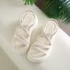 Sandals female 2025 summer new fairy wind round head cross belt casual muffin platform fashion beach roman shoes