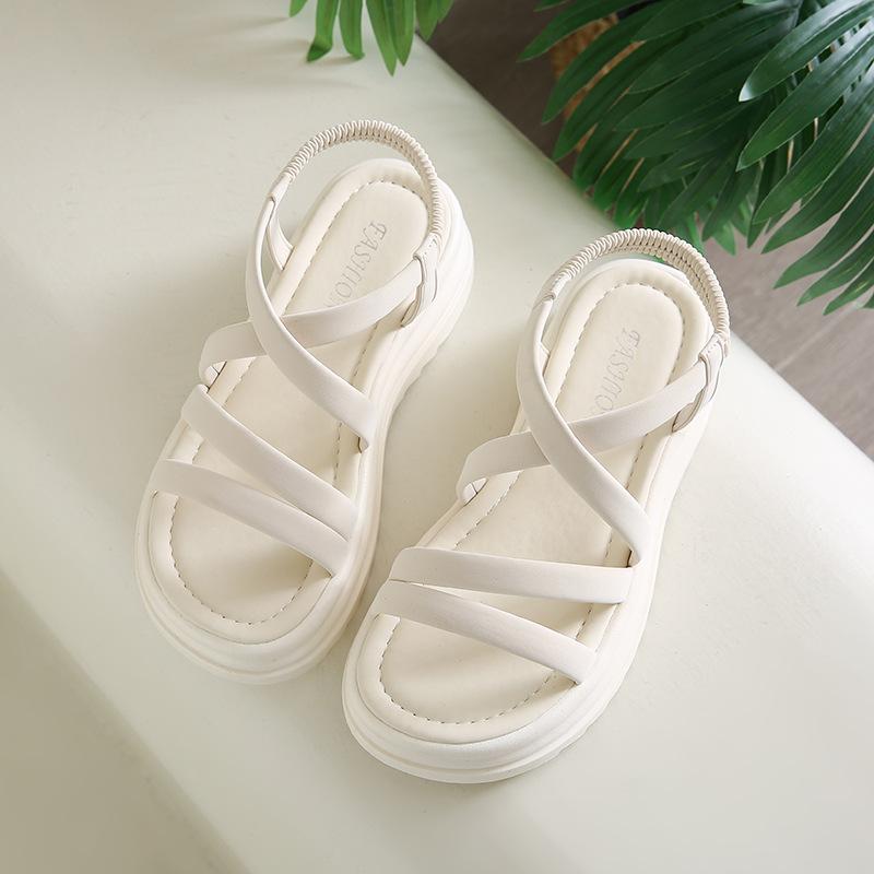 Sandals female 2025 summer new fairy wind round head cross belt casual muffin platform fashion beach roman shoes