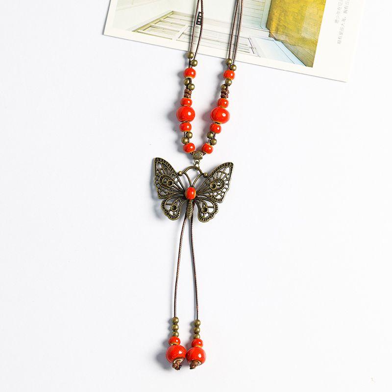 

Butterfly Female Jingdezhen Ceramic Braiding Pendant Sweater Chain Floral glaze red