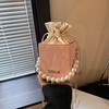 Summer Solid Color 2025 New Personalized Pumping Belt Foreign Leisure Sense Simple Pearl Crossbody Portable Bucket Women's Bag Small