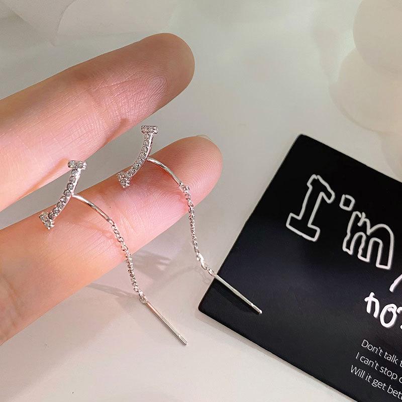 Smiling tassel earrings for women's temperament light luxury high-end sense atmospheric earrings suitable for round faces