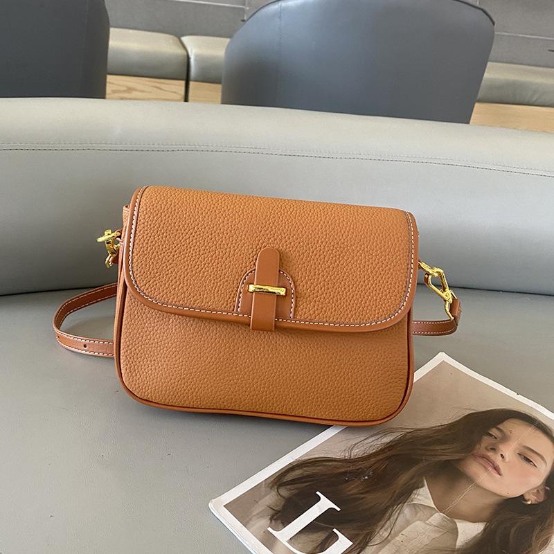 Leather women's bags, high-end first-layer cowhide contrasting color shoulder square bag, new summer women's messenger bag bag.