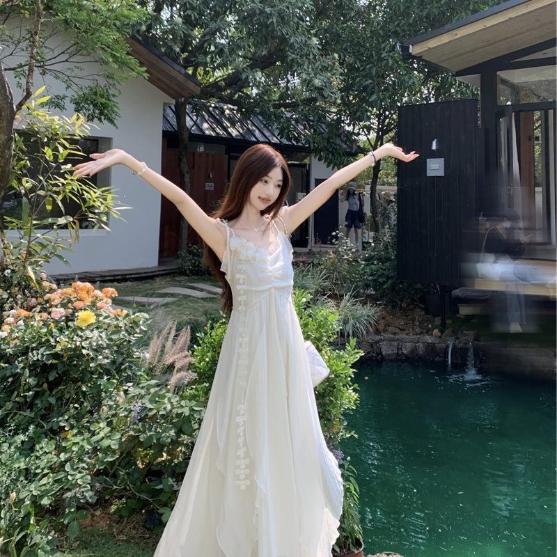 Holiday style flower design suspender dress women's 2026 summer new waist thin very fairy long skirt