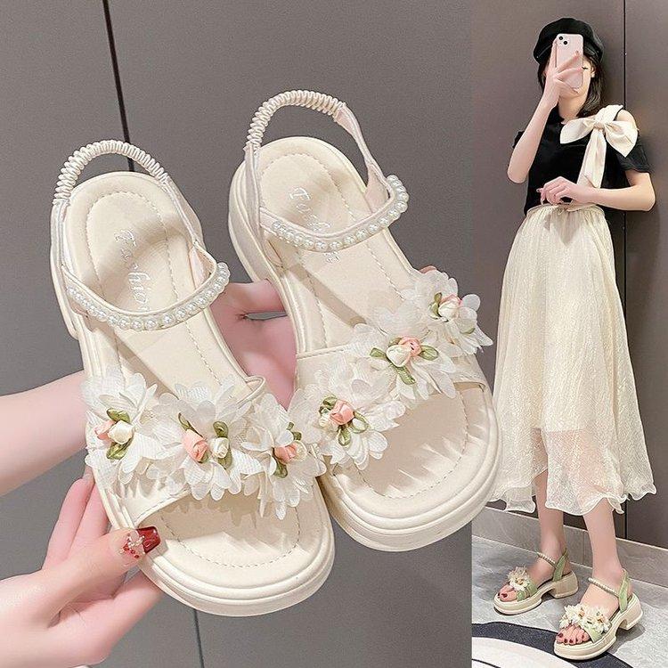 Fairy wind sandals female skirt 2025 new summer muffin platform flower beach shoes Internet celebrity Roman shoes tide