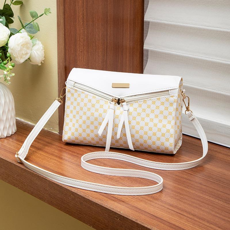 Women's bag, new women's change bag, niche bag, messenger bag, printed shoulder bag, one piece.