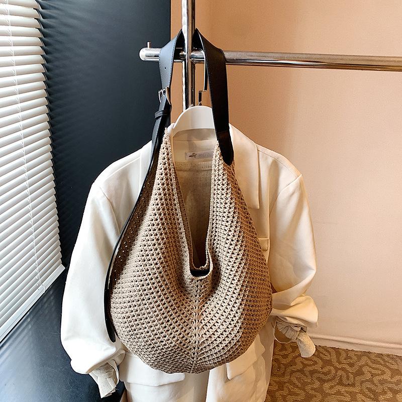 Summer niche fashion versatile woven rope hollow tote design mesh pocket portable child and mother bag shoulder bag