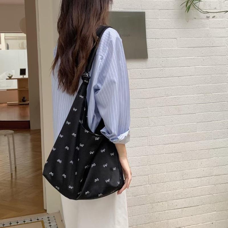 

Niche design bow canvas bag shoulder tote bag shopping bag foldable, new fashion literary style чёрный