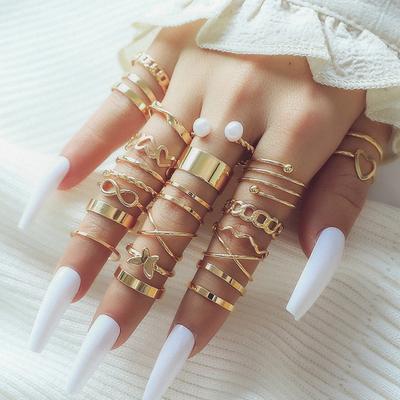 New Fashion Gold Pearl Love Butterfly Cross Hollow Opening 22-piece Suit Ring