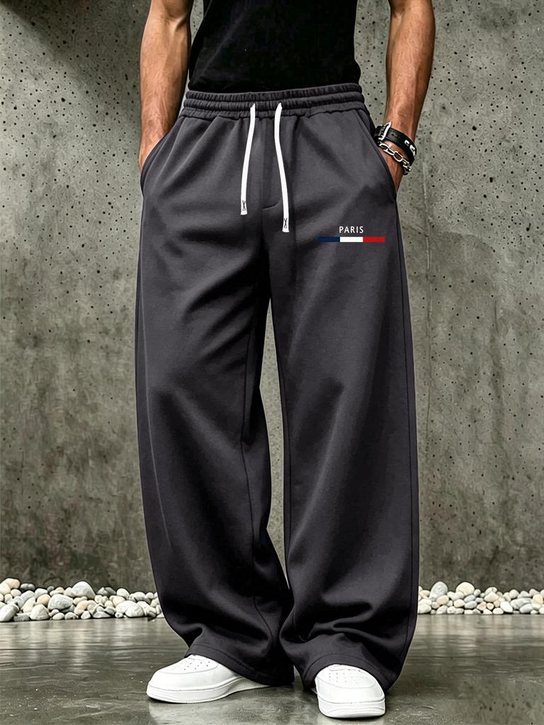 Pantaloni della tuta casual da uomo, pantaloni a gamba larga con coulisse in vita e tasche laterali per il tempo libero all'aperto e l'abbigliamento quotidiano