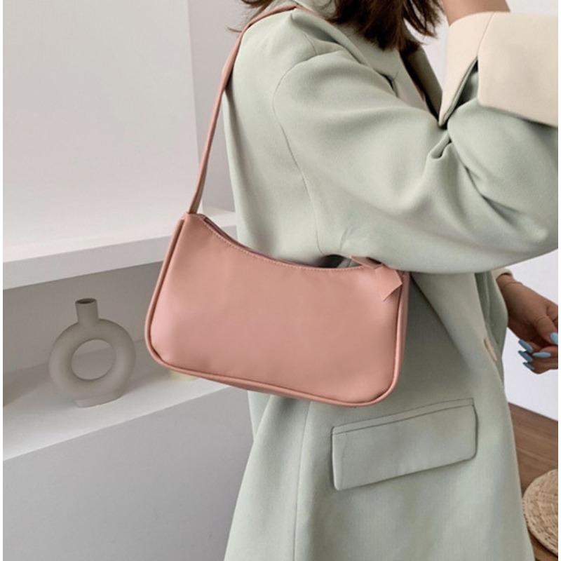 

New baguette bag trendy fashion women s bag shoulder armpit bag mobile phone bag global рожевий