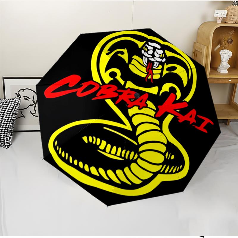 Cobra Kai Fashionable Automatic Opening/Closing Folding Umbrella. Portable and Foldable, Ideal for Gift, Travel, and Daily Use.