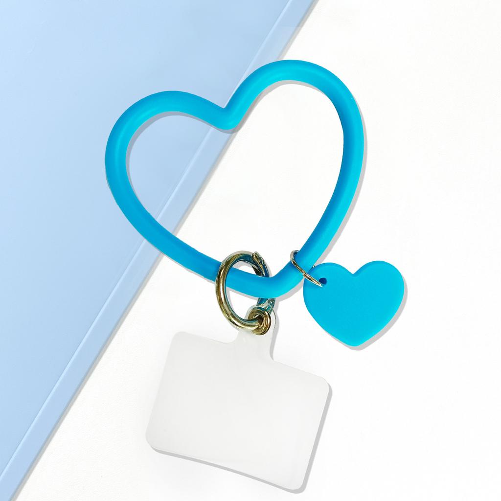 1 szt. Silikonowa bransoletka w kształcie serca, smycz do telefonu komórkowego, przenośny uchwyt na brelok zapobiegający zgubieniu, sznurek na nadgarstek chroniący telefon komórkowy przed upadkiem