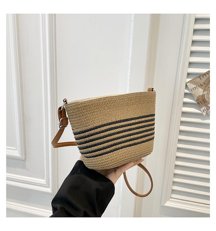 

Spring popular woven tote bag women s 2025 new seaside vacation leisure bag simple versatile messenger bucket bag чёрный