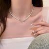 Millet beads pearl bow necklace women's niche high-end clavicle chain new temperament accessories