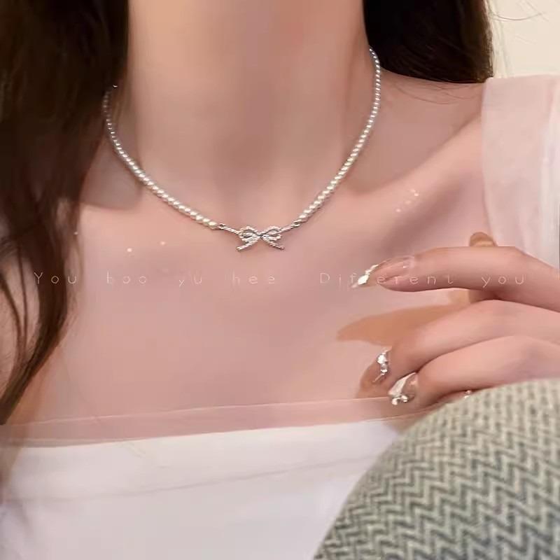 Millet beads pearl bow necklace women's niche high-end clavicle chain new temperament accessories