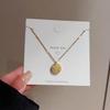 Elegant Fu Xi Pendant: Women's Titanium Steel Necklace with Chinese New Year Design, National Tide Style, Luxurious & Versatile Clavicle Chain.