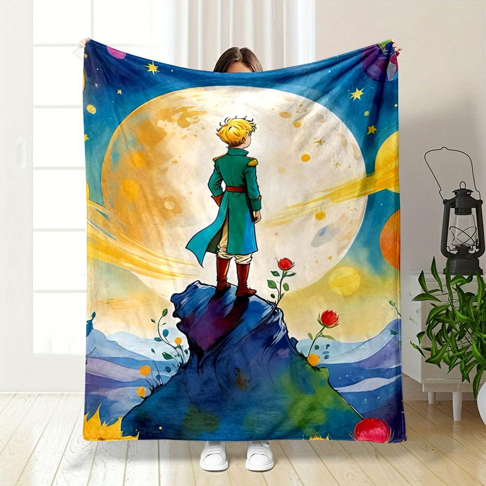 A figure stands on a rock, surrounded by roses and planets in vibrant hues. for all seasons blanket lunch break throw gift