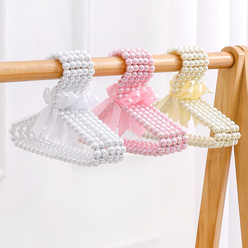 Perlová dětská ramínka: Stojan na sušení novorozeneckého oblečení a úložný prostor ve skříni pro dívky