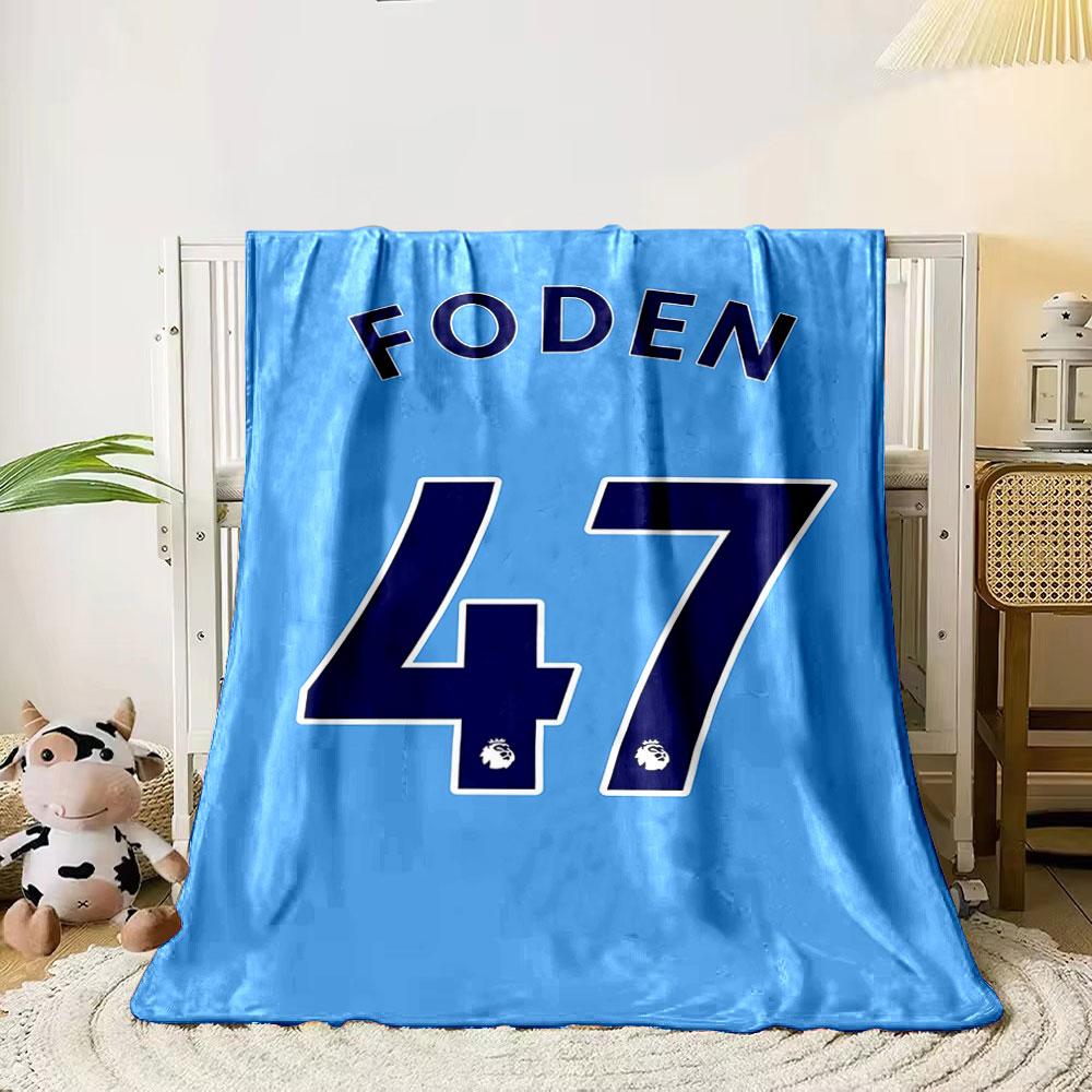 Blue background with FODEN and large navy 47 outlined in white. for all seasons blanket lunch break throw gift 80cm x 120cm