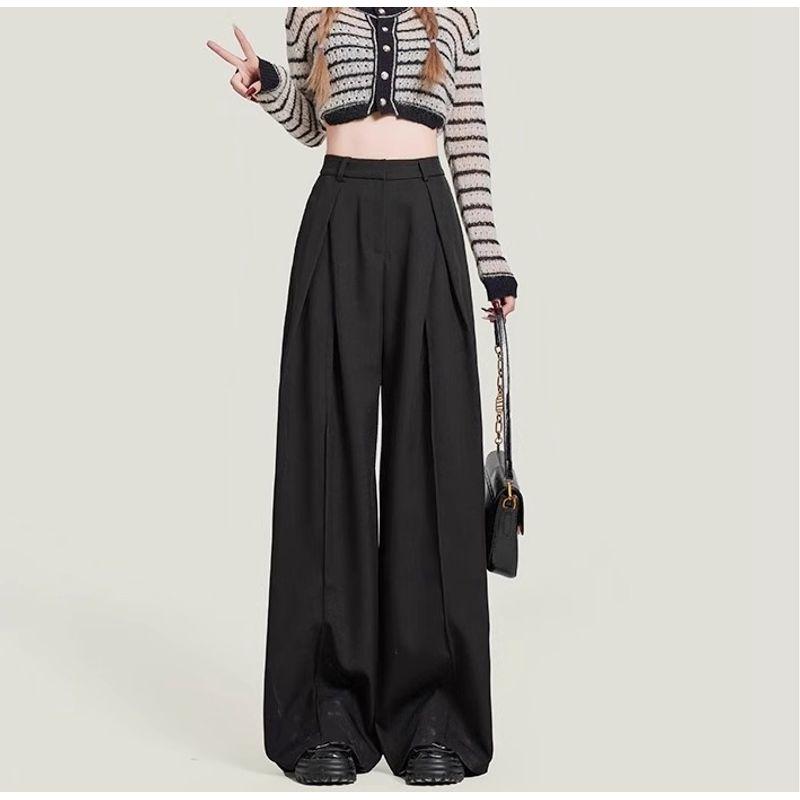 

Серые плиссированные женские брюки большого размера свободного кроя с драпировкой, визуально стройнящие Black 4XL