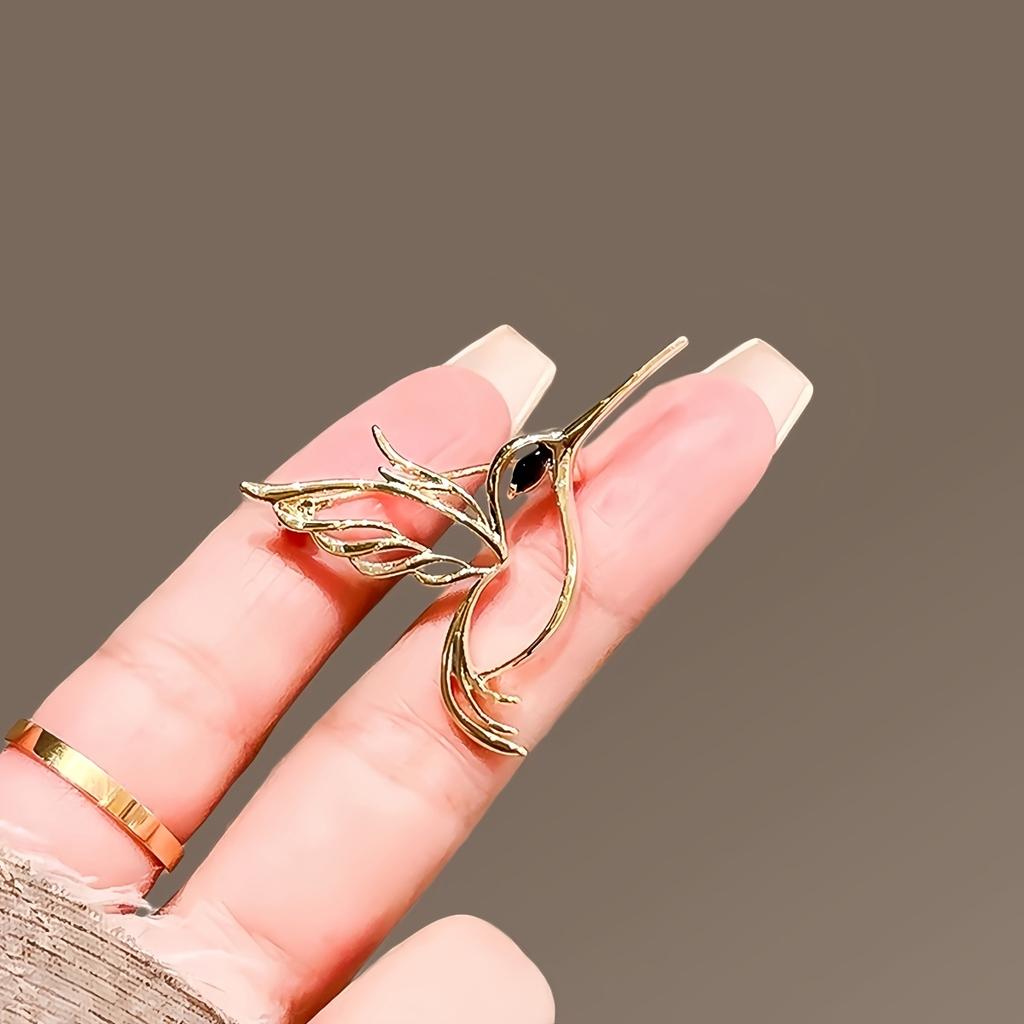 Elegant Hollowed-Out Bird Brooch with Golden-Tone Feathers Black Gemstone Eye - Intricate Animal Motif Jewelry Women Versatile Accessory for Casual