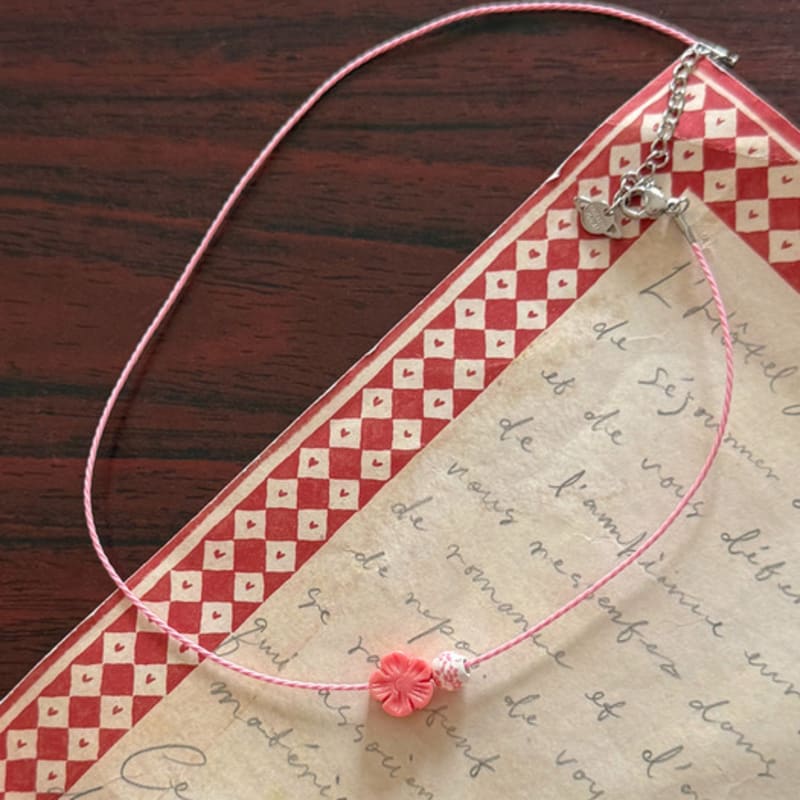 FANTASTIC PLANET cherry blossom string necklace