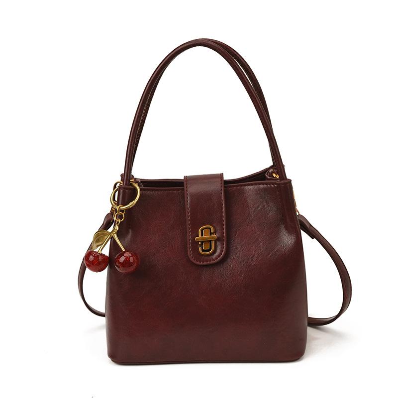 

Autumn and winter Korean niche foreign style portable bucket bag women s high-end sense retro versatile commuter shoulder messenger bag no pendant