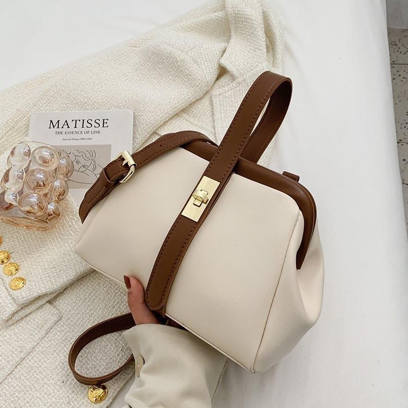 Elegant Vintage Shoulder Bag For Women Featuring Unique Saddle Shape Soft Material
