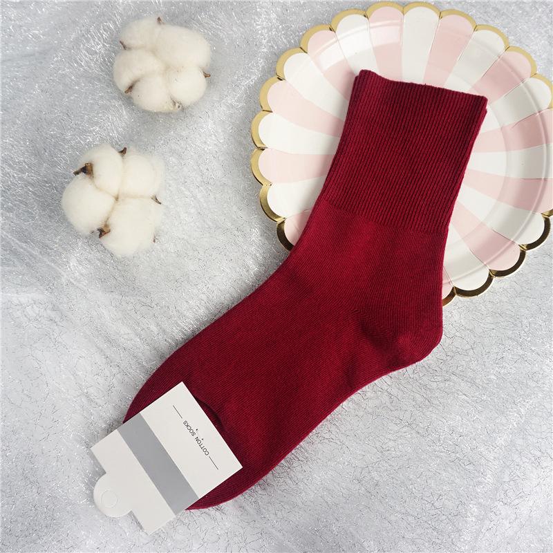 Damen Herbst- und Winter Baumwolle Lockerer Bund Zieht den Fuß nicht Hochrohrsocken