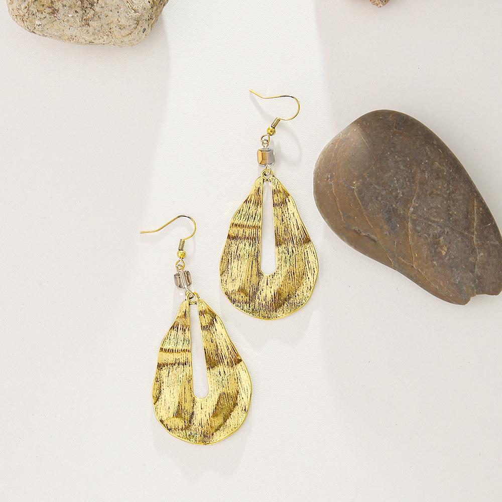 Retro Irregular Water Drop Earrings: Alloy Brushed with Unique Textured Design for Women