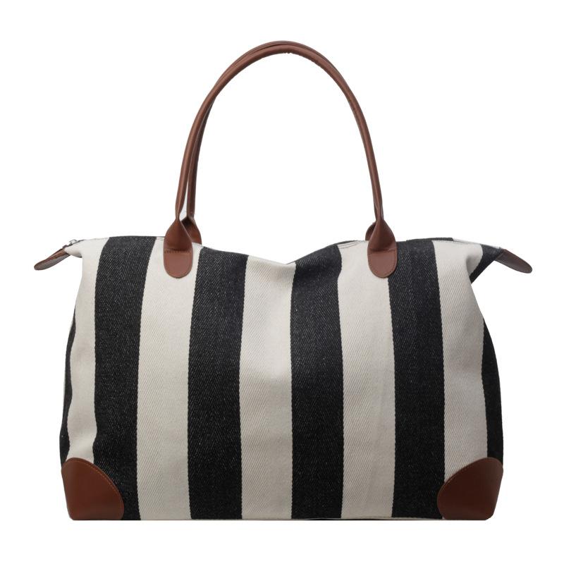 Canvas travel bag, striped fitness, new fashion, large capacity, durable, light shoulder, portable messenger bag, trendy bag.