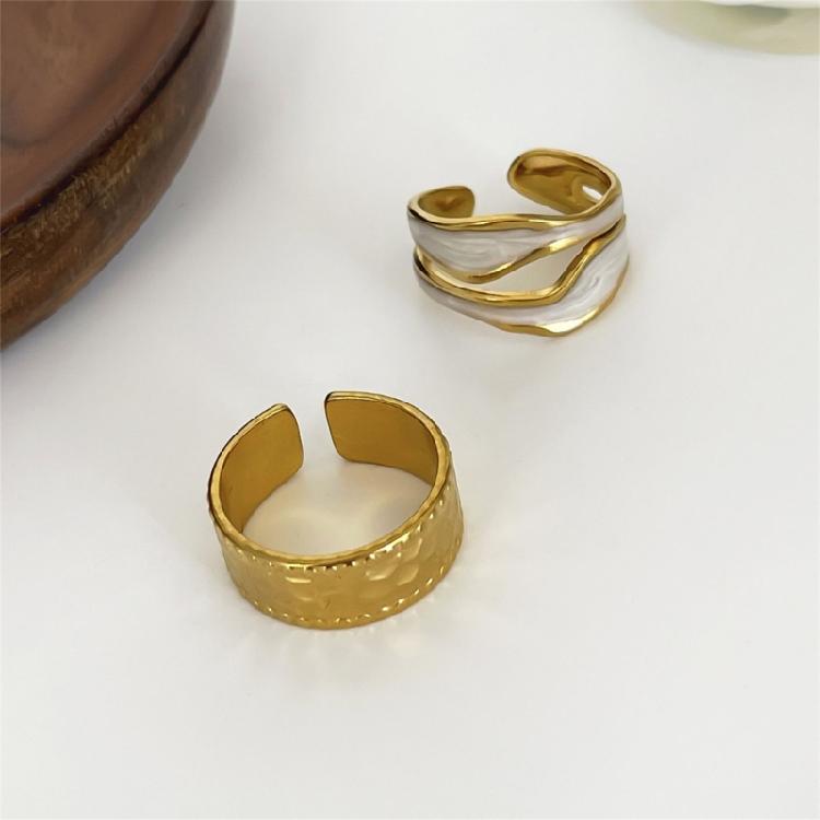 High Quality Alloy Ring With Wrinkle And Hollow Features Enhanced By White Drip Oil For A Sophisticated Touch
