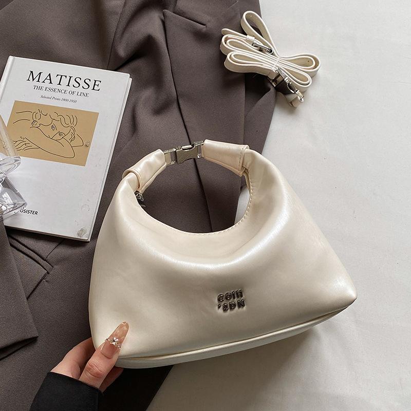 Korean version of fashionable simple high-quality textured wrist dumpling bag niche casual versatile commuter messenger crescent bag women