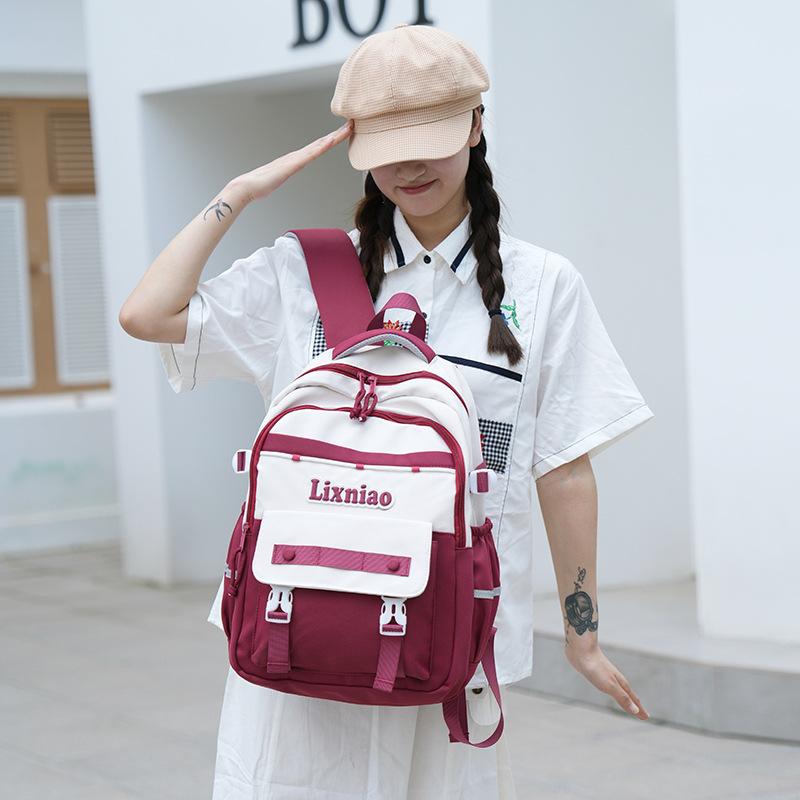 large capacity, fresh and cute, primary and secondary school students splicing contrasting colors, fashionable backpack.