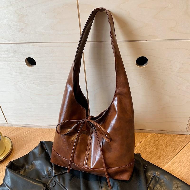 

2025 Korean version niche commuter women s bag versatile casual bag method bow large capacity shoulder armpit tote bag