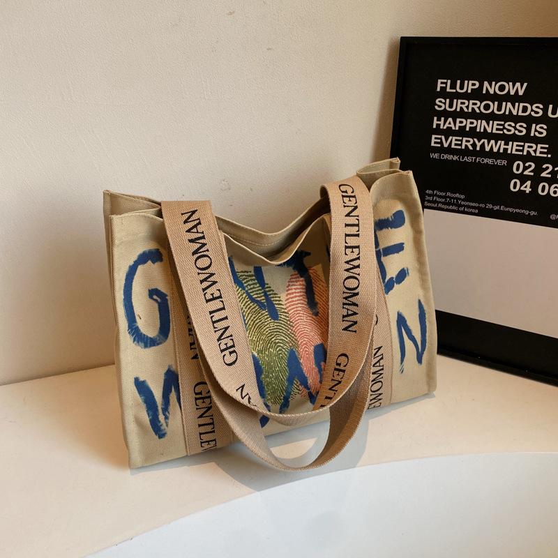 Commuter large-capacity alphabet canvas bag women's new fashion college student shoulder tote bag portable leisure bag