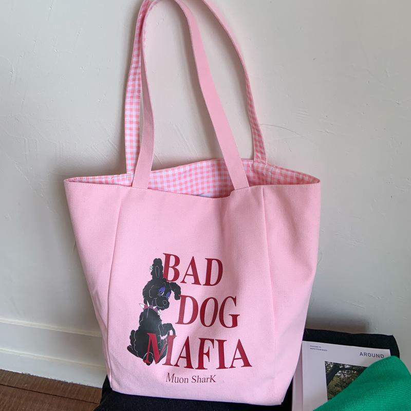 

2025 summer new cute doll printed canvas bag large capacity shoulder bag student fashion portable shopping bag 45*14*35 рожевий