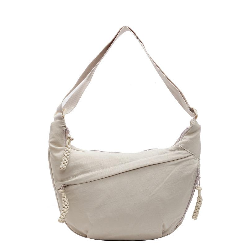 Trendy new products ins simple fashion lightweight sports style dumpling bag leisure travel versatile solid color messenger bag women