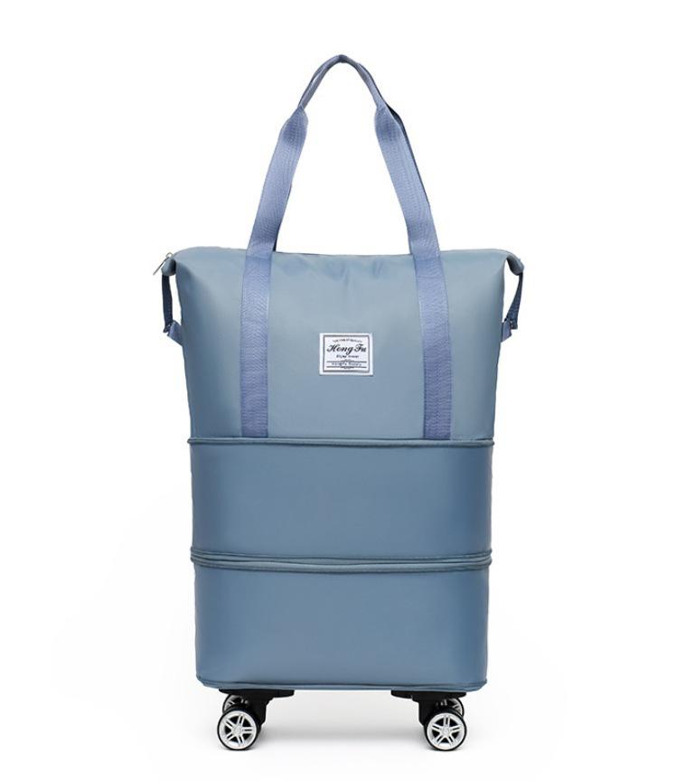 

Expandable Large Capacity Travel Bag with Universal Wheels – Waterproof, Dry/Wet Separation, Ideal for Students, Business Trips, and Maternity Use.