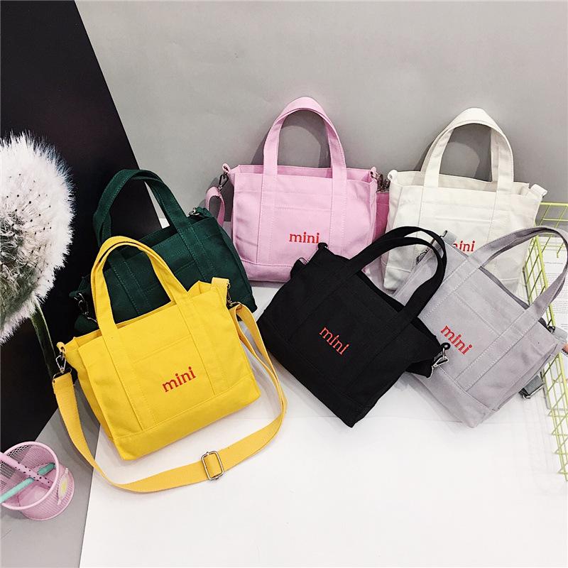 Fashion 2019 new dual-purpose canvas bag, fresh and casual simple letter student shoulder oblique span bag
