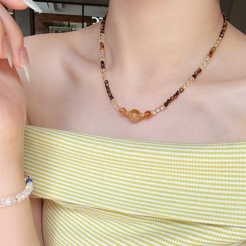 

Handmade Natural yellow crystal necklace for women, vintage niche, light luxury, high-end, elegant collarbone chain Golden Tiger Eye Stone Ne
