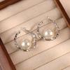 2025 Exaggerated Imitation Pearl Earrings: Stylish Silver Fragmented Ear Studs