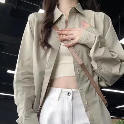 Designerska zmysłowa kurtka koszulowa Niche dla kobiet Wiosna i Lato Nowa haftowana retro casualowa luźna koszula z długim rękawem chroniąca przed słońcem