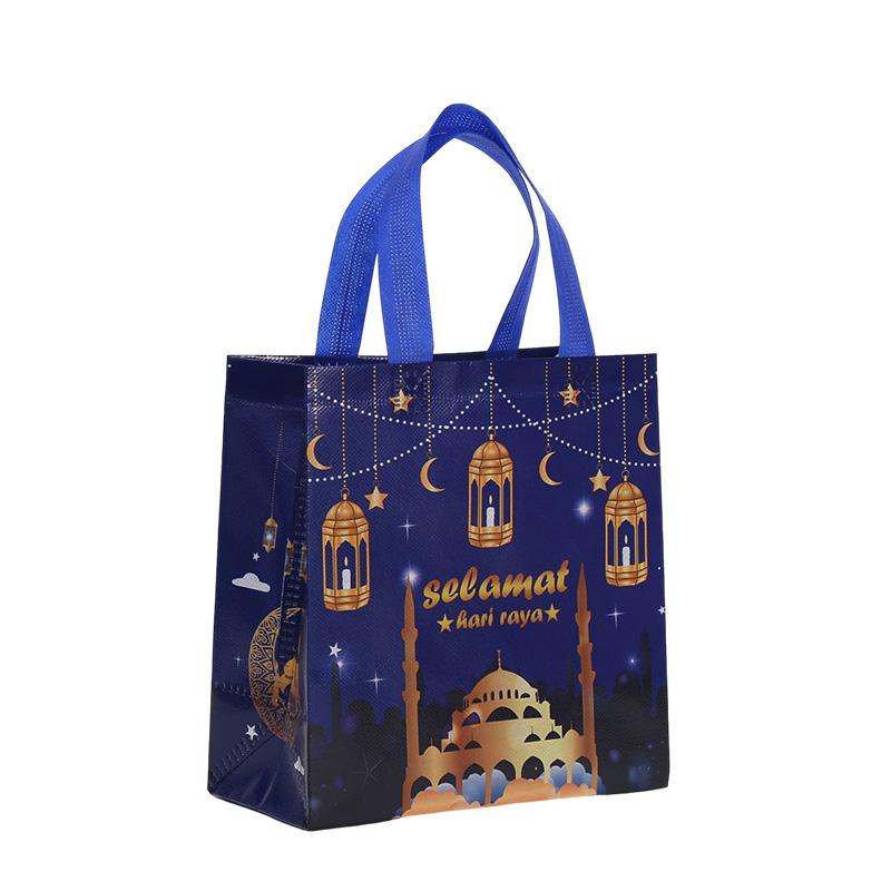

4PCS Eid Mubarak Gift Bags Moon Star Non-Woven Handbag Reusable Ramadan Gift Packaging Bag Islam Muslims Festive Party Supplies 23x22x11cm