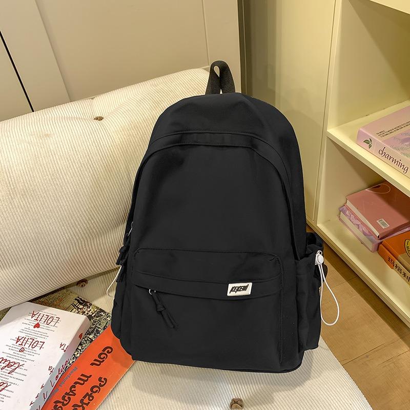 Simple casual large-capacity backpack women's new junior high school high school student schoolbag versatile travel backpack