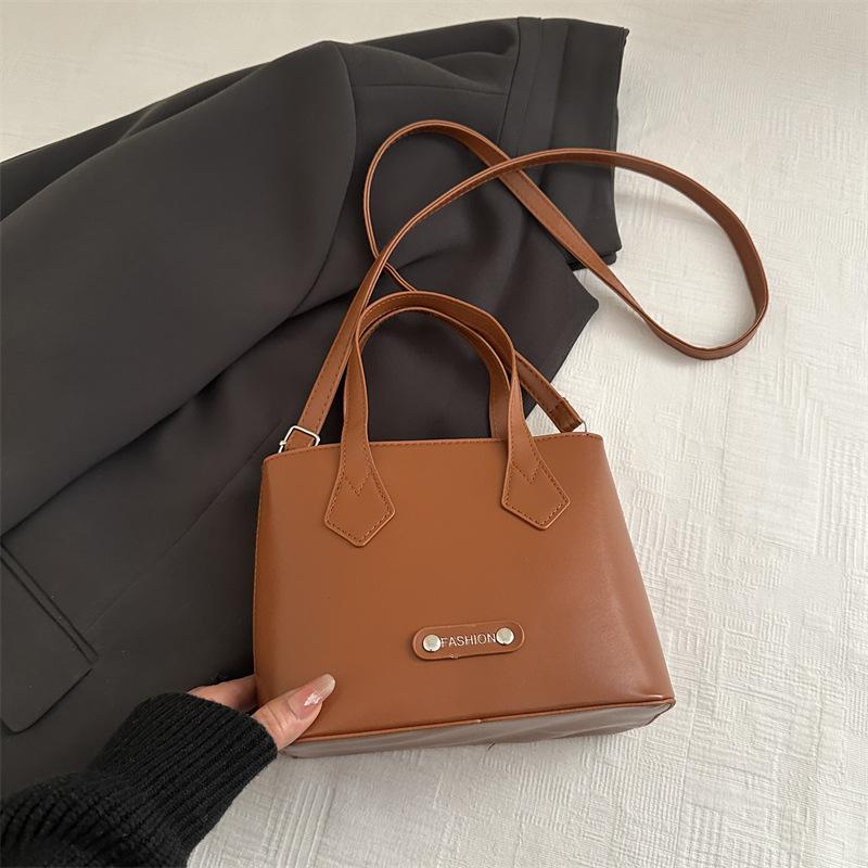 

Exquisite ultra-small bag women s 2025 new contrasting color versatile messenger bag fashionable portable bucket bag small bag світло-коричневого кольору