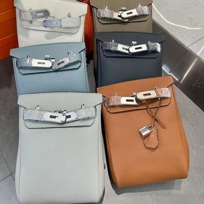 2025 neue Unisex Top Layer Rindsleder Brusttasche Umhängetasche aus echtem Leder Rucksack mit Schloss hängende Dekoration