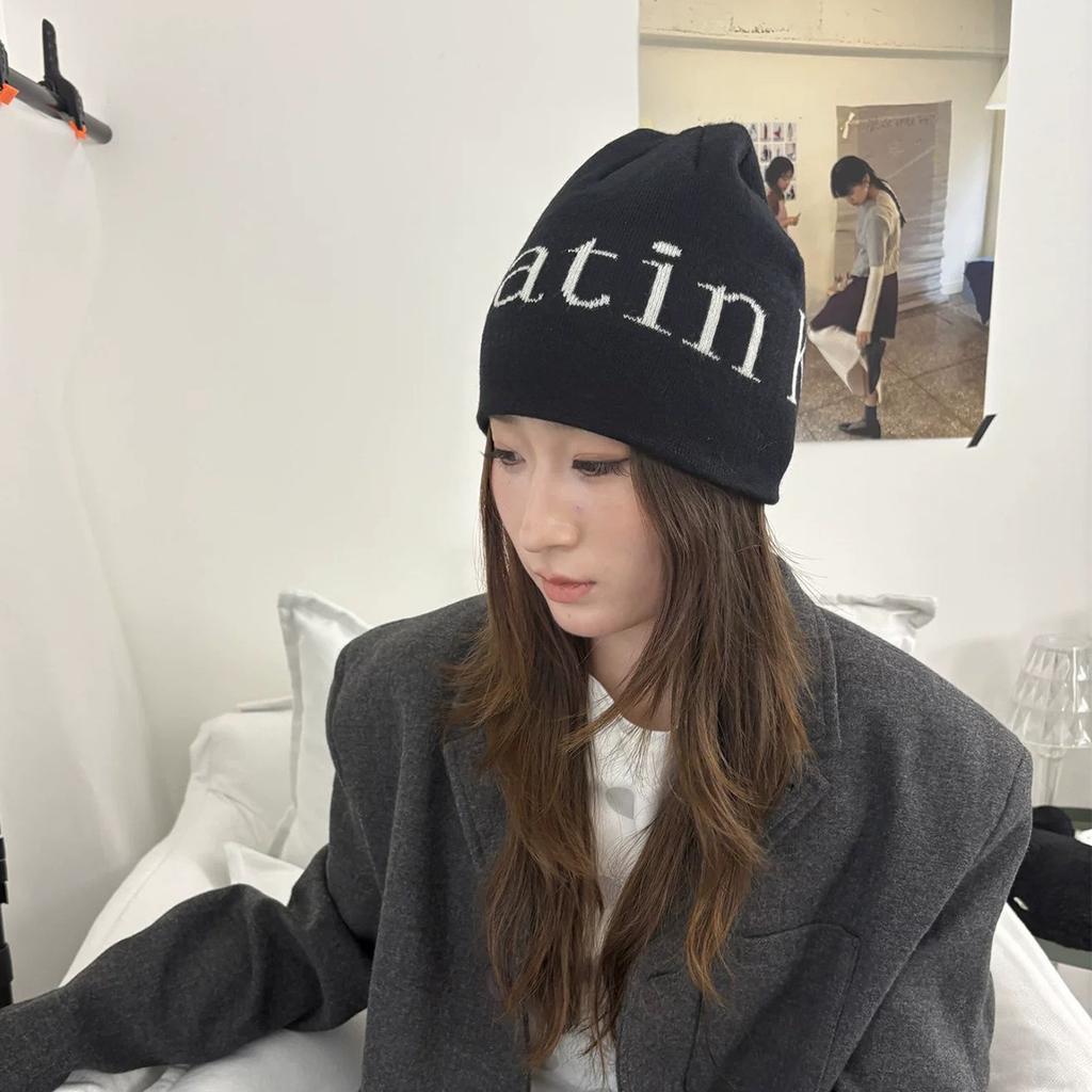 Autumn and winter street letter jacquard knitted hats for men and women to keep warm and wear niche cold hats, pullover hats