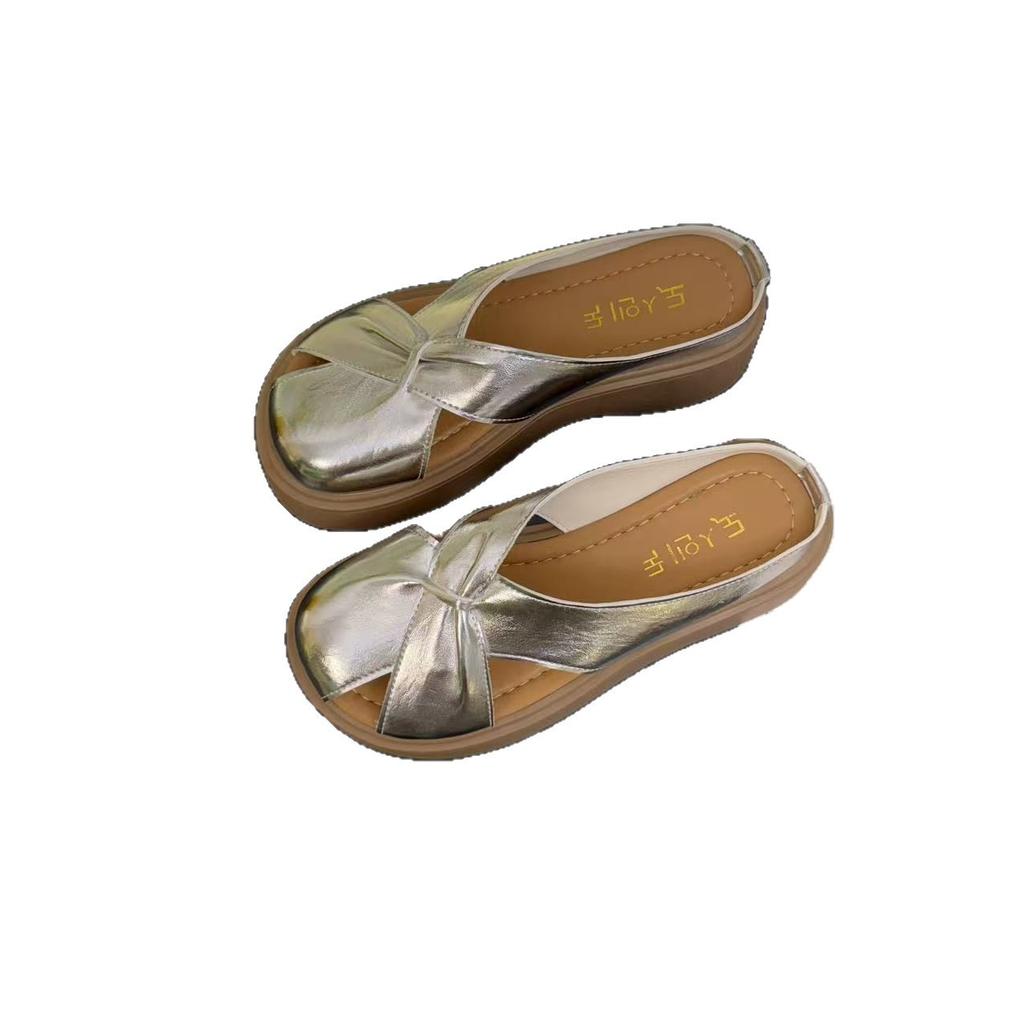 Baotou hollow slope heel half drag sandals women wear summer new French temperament flat bottom one word cool single shoes