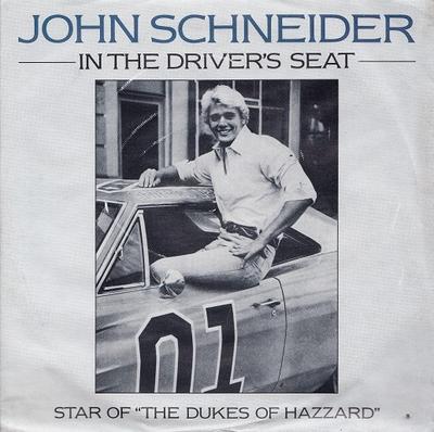 7-Zoll-Schallplatte JOHN SCHNEIDER - In The Driver's Seat SCTA2231 Scotti Bros. Re 1982 UK Folk Gebraucht